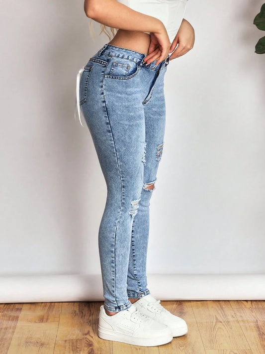 Distressed Skinny Jeans with Bow Back image 3