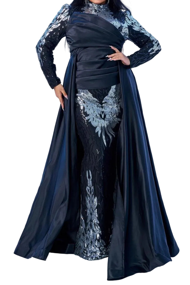 Black evening gown with silver lace details on a white background