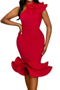 Red dress with ruffled details worn by a person, standing on steps.