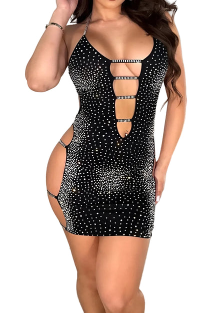 Black dress with cut-out design and rhinestone details on a white background