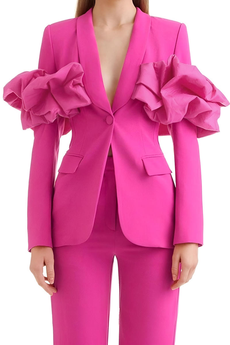 Pink blazer with ruffled shoulders on a white background