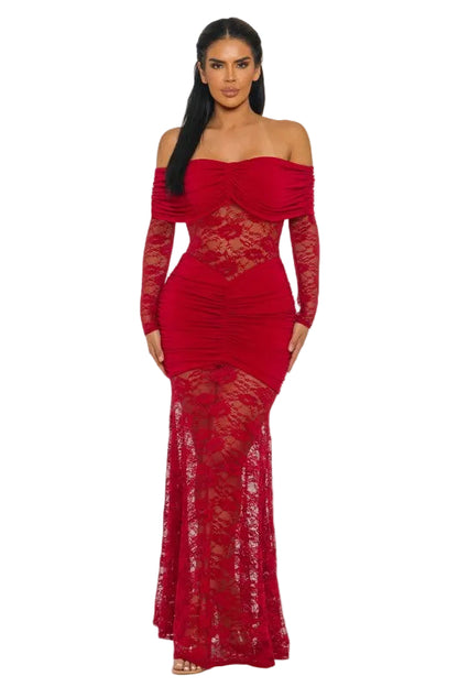 Woman wearing a red lace off-shoulder dress on a white background