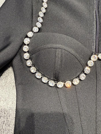 Close-up of rhinestone bust detail on feather hem midi dress-2