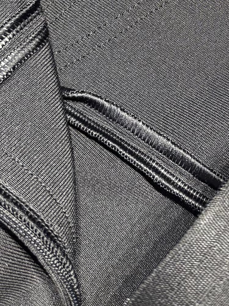 Close-up of fabric on rhinestone bust feather hem midi dress