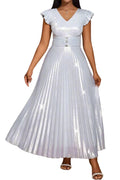 Woman wearing a light blue pleated dress with ruffled sleeves in an indoor setting.
