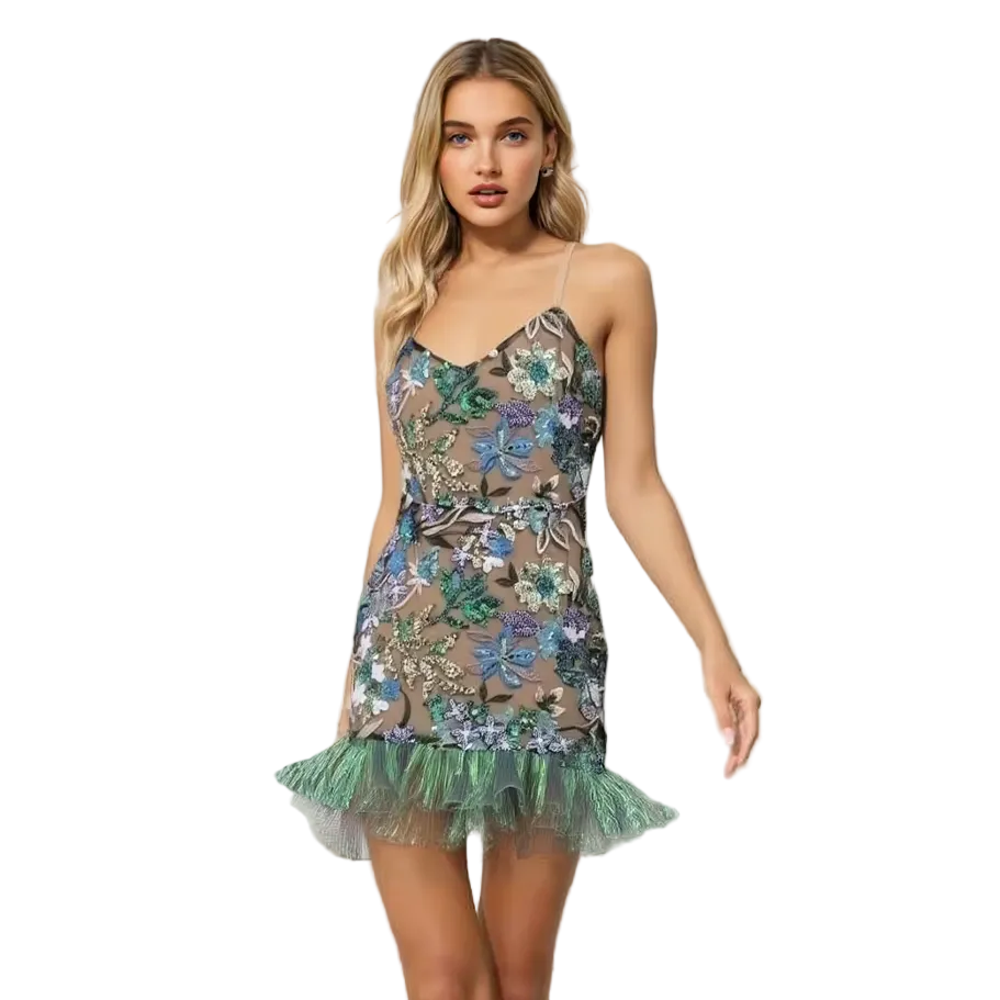 Woman wearing a floral dress in an elegant indoor setting